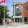 Atlantic Lottery Corporation headquarters building with flags