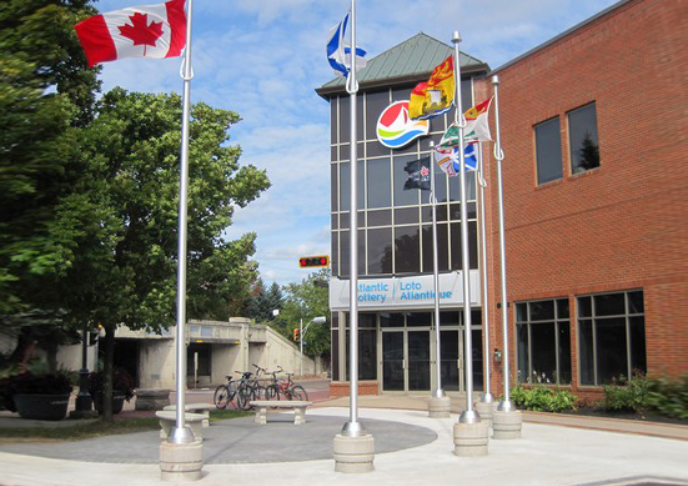 Atlantic Lottery Corporation headquarters building with flags